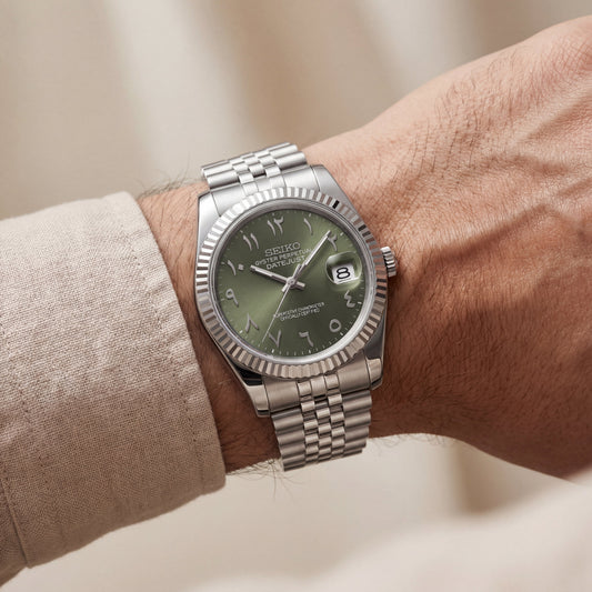 Luxury Silver Stainless Steel Watch Fluted Bezel Olive Green Sunburst Dial Arabic Numerals Jubilee Bracelet Premium Automatic Watch – Men