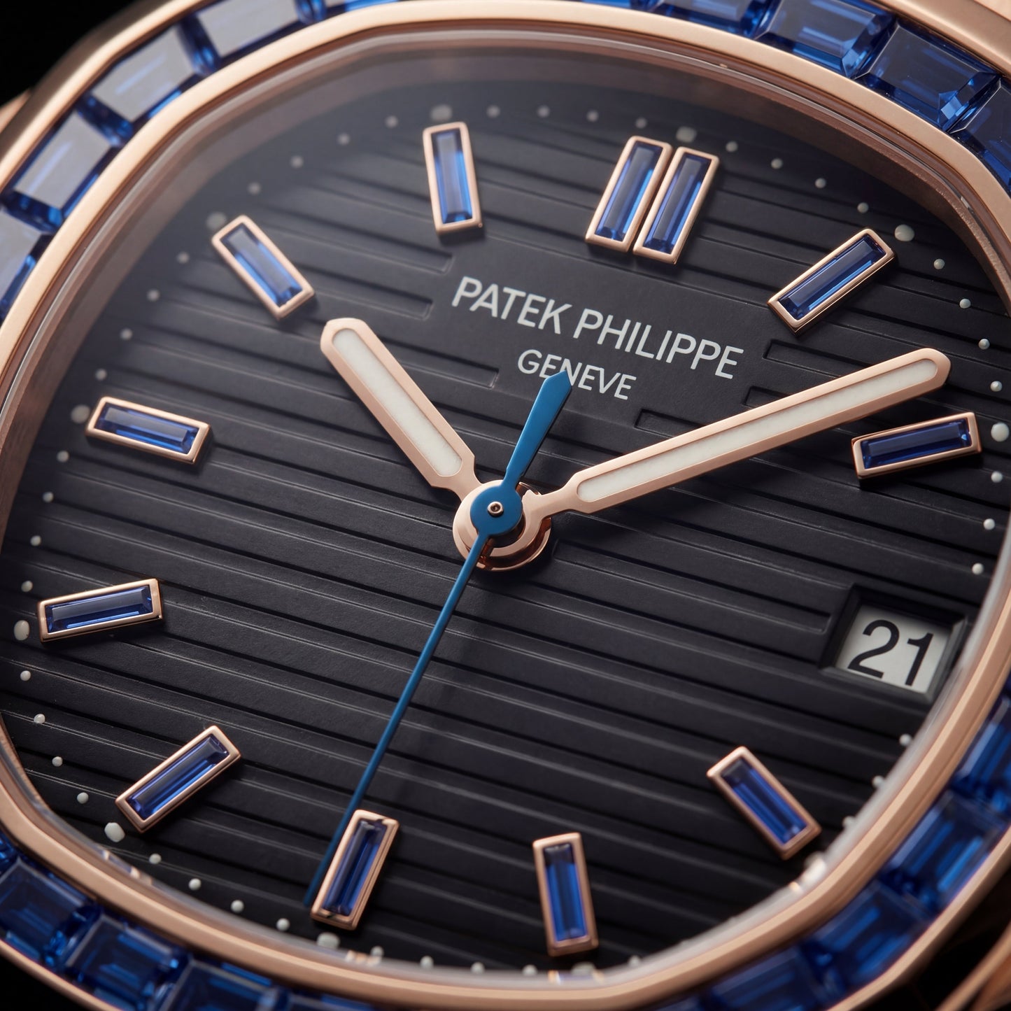 Rose Gold Stainless Steel Watch with Blue Gem Bezel & Black Dial